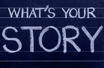 Chalkboard spelling "What's your Story?"